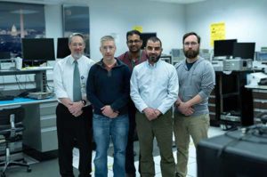 The team developing a GPS receiver for use in and around lunar orbit (from left): Jason Mitchell, Luke Winternitz, Luke Thomas, Munther Hassouneh and Sam Price. (Photo: NASA/T. Mickal)