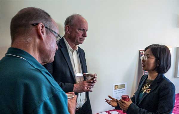 Xiaochun Lu discusses China’s Comprehensive PNT Plan with Rich Lee of iPosi and Logan Scott of Logan Scott Consulting at 2019 Stanford PNT Symposium. (Photo: Stanford University)