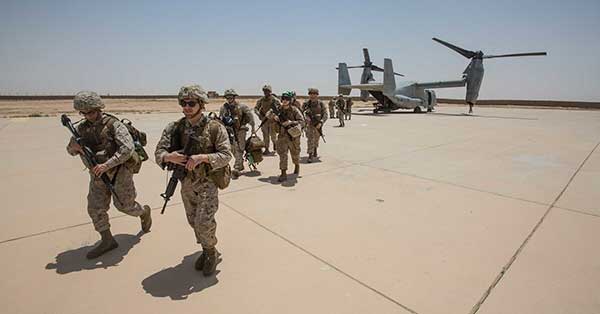 Photo: U.S. Marines at Al Asad Air Base in 2018. (Cpl. Jered T. Stone/Marine Corps)