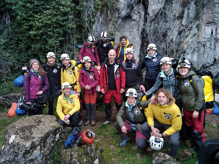 The 15 participants stand outside the Lombrives cave, France. (Photo: GeoSLAM)