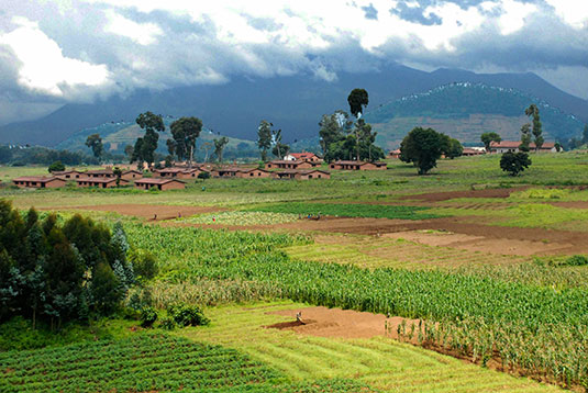 The new SBAS services are expected to aid agriculture and other sectors in Africa. Here,volcanic cinder cones and farming in rich volcanic soils on the border of the Democratic Republic of Congo and Rwanda. (Photo: iStock/Getty Images Plus)