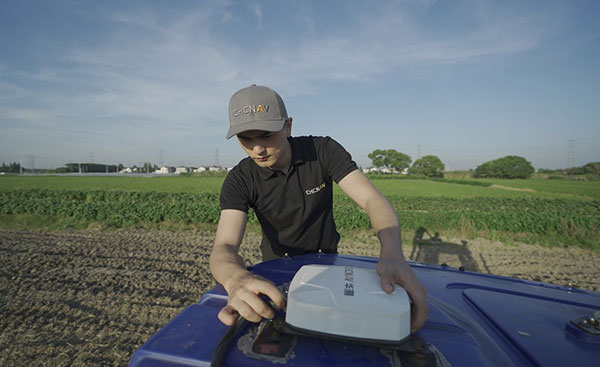 Installation of the NX510 Pro auto-steering system to a tractor. (Photo: CHCNAV)