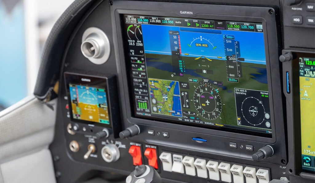 A cockpit is displayed with Garmin avionics installed. 