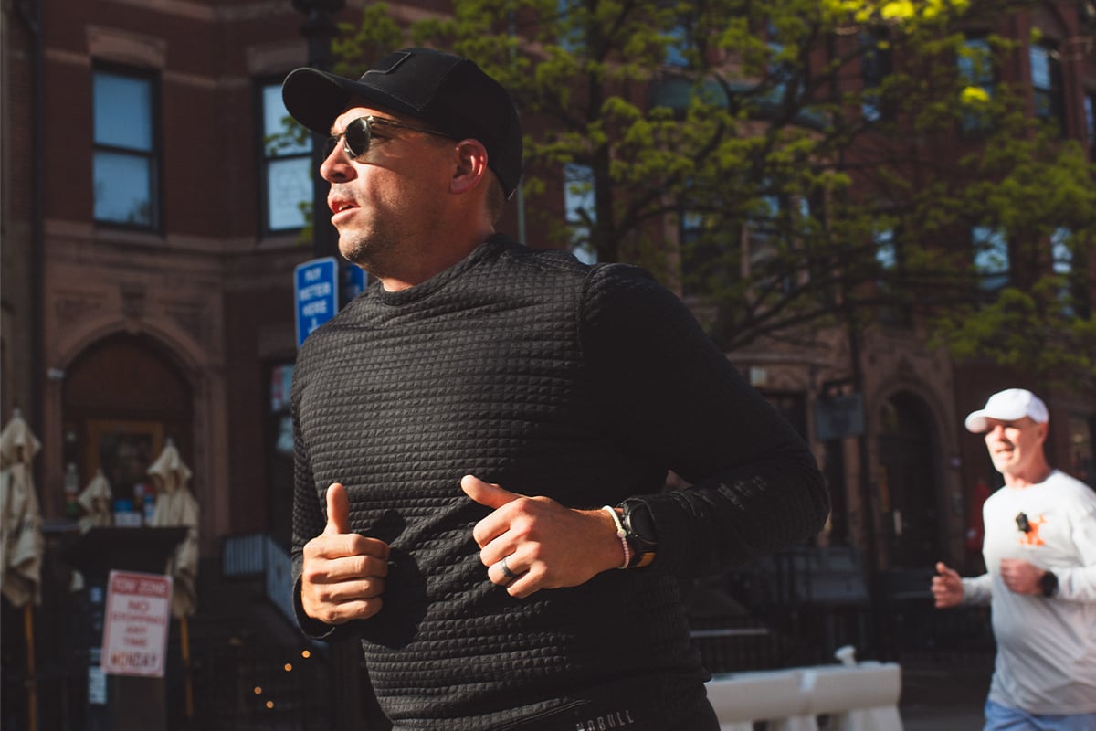 PGA TOUR pro Scott Stallings, wearing a black shirt and hat, goes for a shakeout run before the Boston Marathon.