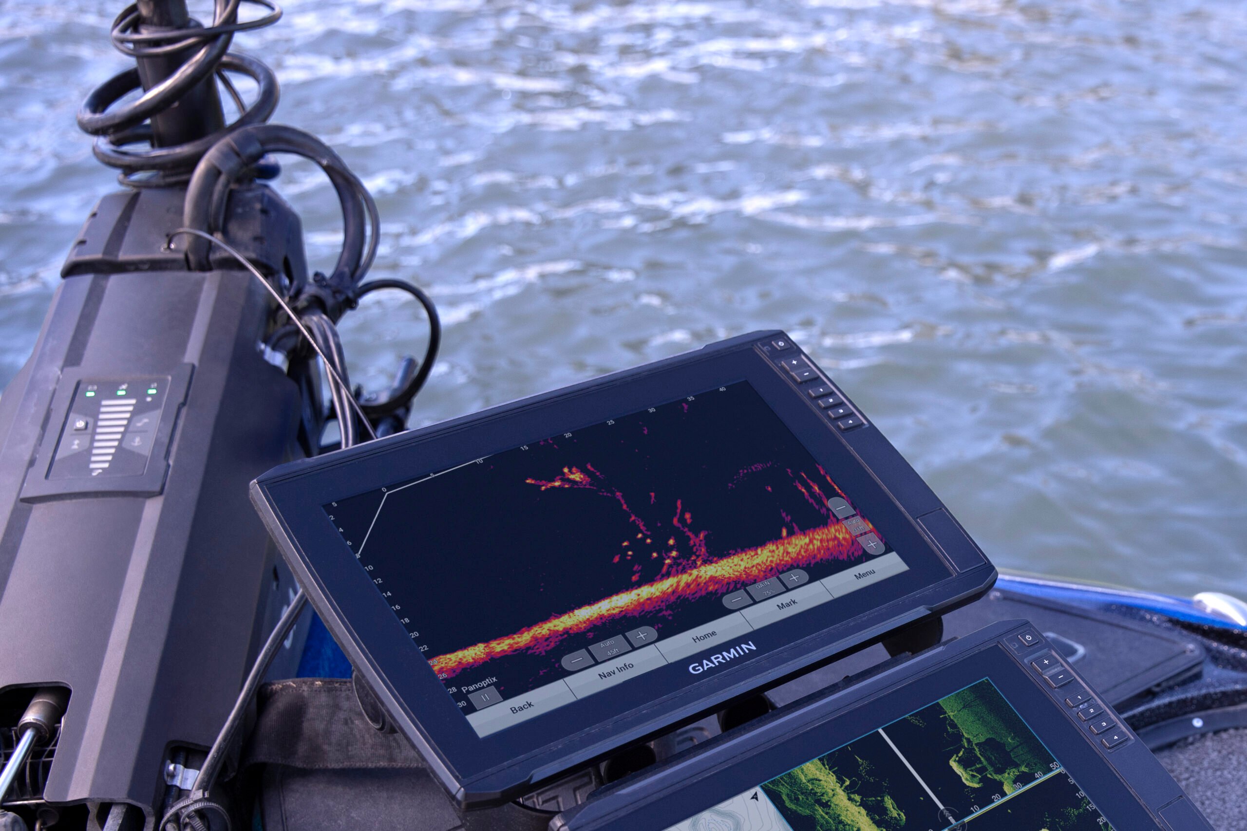 Up close shot of LiveScope on someones boat and water in the background.