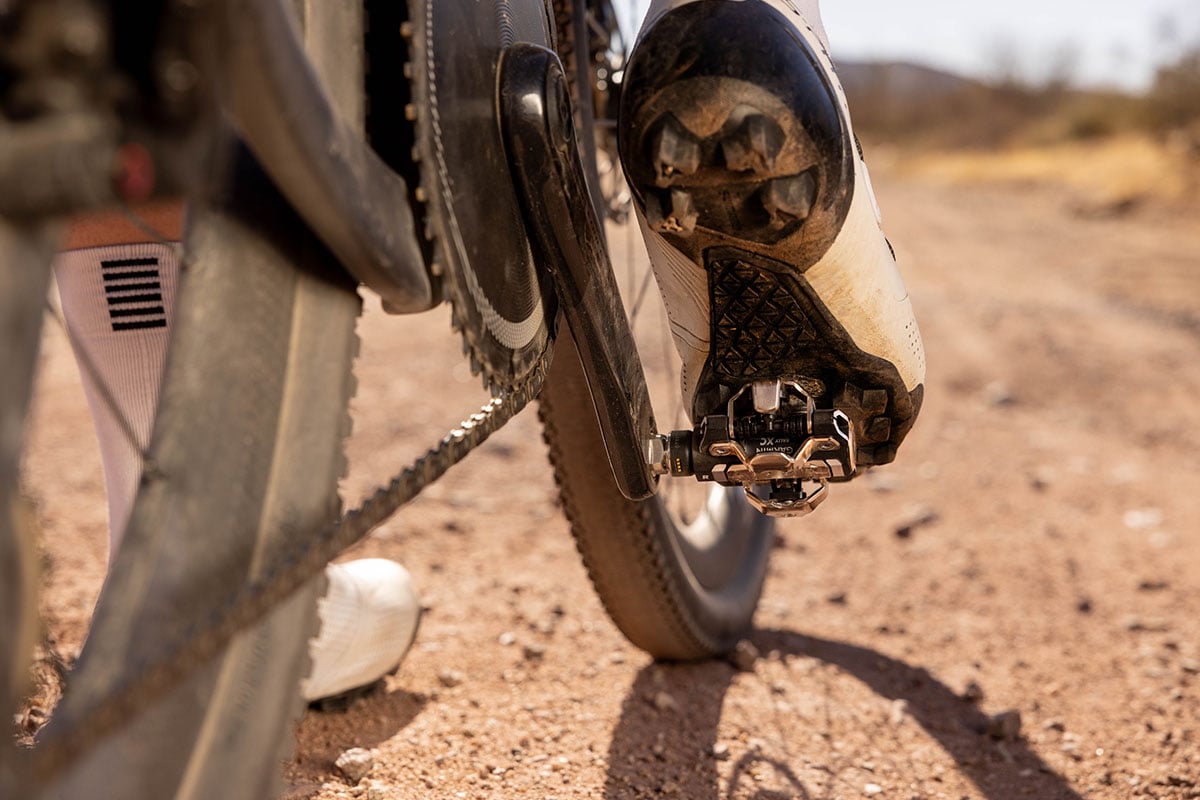A cyclist uses Garmin Rally power meter pedals.